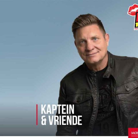 A man with short brown hair wearing a black leather jacket smiles at the camera. The text reads Kaptein & Vriende, featuring Kaptein himself. Logos for Hot 102.7 FM and Montecasino appear in the top right and bottom right corners.