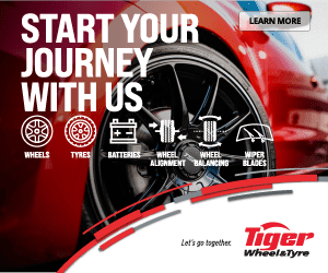 Close-up of a car wheel with text: Start your journey with us. Icons for wheels, tyres, batteries, wheel alignment, wheel balancing, and wiper blades. Tiger Wheel & Tyre logo and Lets go together.