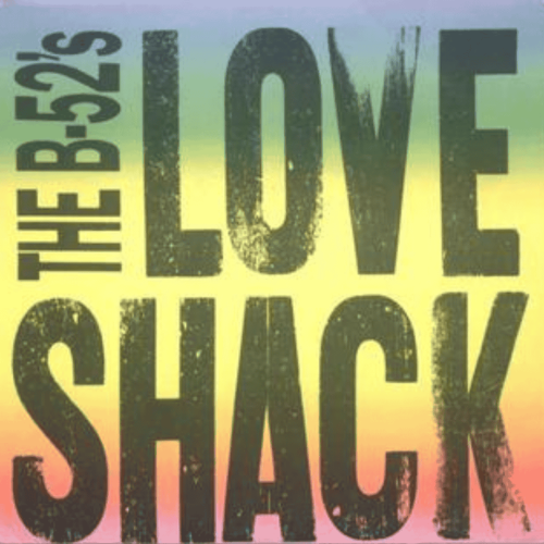 Text on a pastel rainbow background reads Love Shack in large, bold, distressed letters, celebrating the iconic B-52s hit.