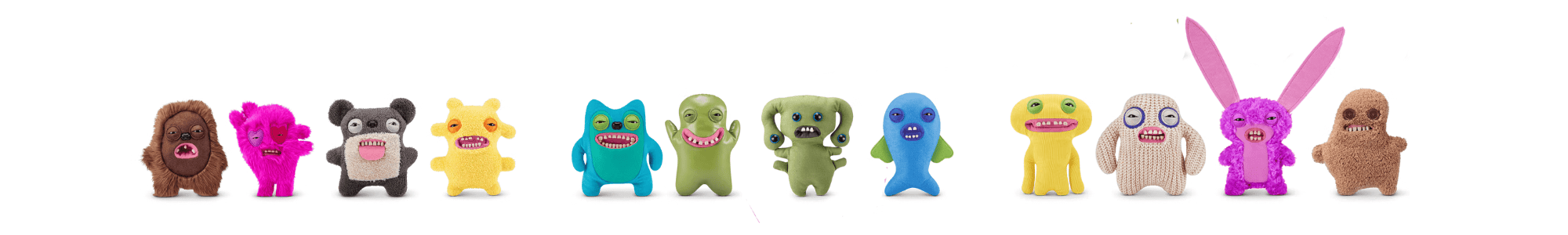 A row of twelve colorful, plush monster toys with different shapes, colors, and facial expressions stands side by side on a white background—perfect for adding playful charm to any child's room or celebrating milestones like homeownership.