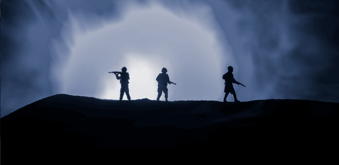 Three armed soldiers are silhouetted against a bright, smoky blue light, standing on a hill in the Magaliesberg, with a dramatic, cloudy sky behind them.
