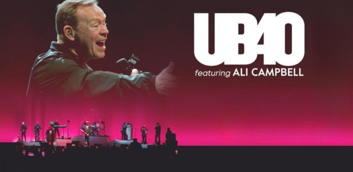 A large image of a man singing appears above the text UB40 featuring Ali Campbell on a red-lit stage, with UB40 band members performing and silhouettes of the audience in the foreground.
