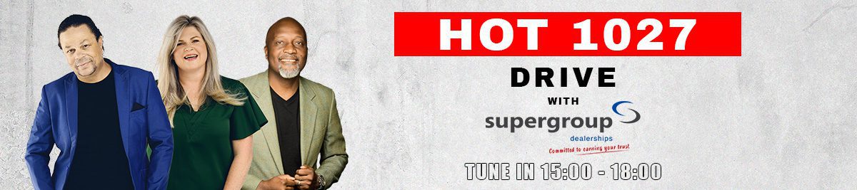 Three smiling radio hosts stand side by side in front of a grey background. Text reads: HOT 1027 DRIVE with supergroup dealerships—your ultimate matric drive-time show. Tune in 16:00 - 18:00.